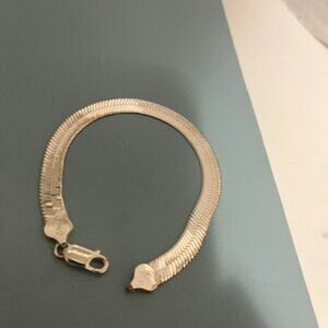 Herringbone link sterling silver bracelet.